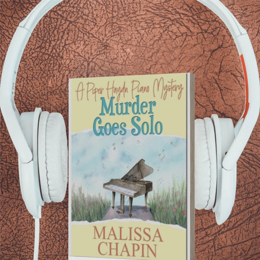 picture shows the cover of Murder Goes Solo with headphones 